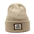 Close-up of khaki ribbed knit beanie featuring a Wild Life Adventures patch with bear graphic - M (56-58cm) / Beige