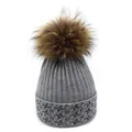 Detail of grey knitted winter beanie featuring star patterns and a fluffy fur pom-pom - M (56-58cm) / Gray