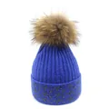 Close-up of royal blue knit beanie featuring sparkling silver thread and faux fur pom-pom - M (56-58cm) / Sapphire Blue