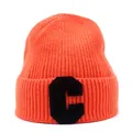 Detail view of ribbed knit orange beanie with black letter C patch embroidery - Orange