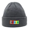 Close-up of dark grey knit beanie with colorful WYLS letter patch and fine texture - M / Gray