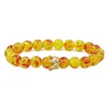 Detail of amber resin beads with a golden CZ crown charm on an elastic bracelet - Amber Gold Crown Single