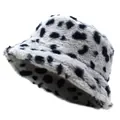 Detailed view of plush faux fur texture and cow pattern on a winter bucket hat - M (56-58cm) / Gray