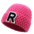 Detailed view of thick knit texture and embroidered letter R on hot pink beanie - M / Rose Red