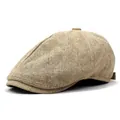 Détail d'une casquette plate kaki en lin et coton respirant avec texture vintage - M / Kaki