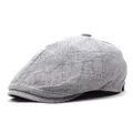 Béret classique gris pour homme en lin de coton respirant sur fond blanc neutre - M / Gris