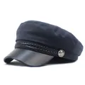 Close-up of navy twill baker boy hat with black faux leather brim and braided rope detail - M / Navy Blue