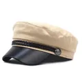 Detail of khaki military cap featuring black leather brim and silver crest button - M (56-58cm) / Beige