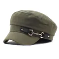 Macro detail of military style flat top cap in dark green canvas with metal horsebit - M / Green