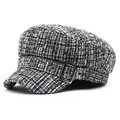 Classic black and white tweed newsboy cap with a flat top and silver metal buckle detail - M / Black