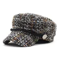 Detail of tweed navy cap showing woven texture, braided rope, and anchor embossed button - M / Orange