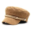 Detailed macro view of khaki corduroy fabric with golden rope and buttons on the hat - M (56-58cm) / Khaki