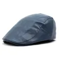 Detailed view of the dark blue PU leather texture and stitching on the flat cap - M (56-58cm) / Blue