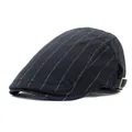 Detail view of black cotton flat cap with gold stripes and silver metal buckle - M (56-58cm) / Vintage Flat Cap (SX-601) / Black