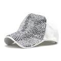 Close-up of sparkling silver rhinestones on the brim of a white cotton baseball cap - M (56-58cm) / White + Silver