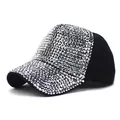 Detailed view of silver rhinestones on a black curved brim baseball cap with sparkles - M (56-58cm) / Black And Gun Gray