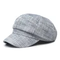 Detail shot of the blue and white tweed texture and curved brim of the baker boy hat - M (56-58cm) / Blue