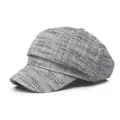 Classic black and white tweed newsboy cap for women featuring textured woven fabric style - M (56-58cm) / Black