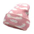 Detailed close-up of pink knit beanie featuring soft white cloud patterns and cuffed hem - M (56-58cm) / Pink