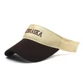 Detail of embroidered NEBRASKA logo on cotton sun visor hat with two-tone fabric texture - Brown