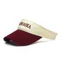Close-up of Nebraska letter embroidery on two-tone cotton sun visor hat - Burgundy