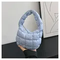 Mini light blue quilted cloud bag with padded texture and stylish top handle design - Light Blue