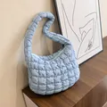 Stylish light blue quilted bubble hobo bag with thick shoulder strap and padded texture - Blue