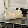 Chic off-white tote bag with pebble texture and wide strap for professional daily use - White