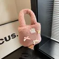 Pink lamb wool bucket bag with lace and satin bow details for a sweet aesthetic - Pink