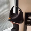 Elegant black jacquard handbag with amber bead accents and traditional Chinese patterns - Black