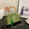 Oriental green silk handbag with bamboo handle and gold frame in vintage style - Green