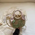 Handmade beige woven straw bag with green flower decor and pink floral silk handle scarf - Green