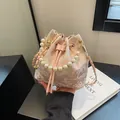 Pink jacquard bucket bag with floral embroidery, pearl handle and gold chain strap - Pink Pavilion