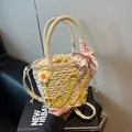 Beige woven straw tote bag with yellow hello embroidery and pink floral ribbon bow - Yellow