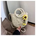 Off-white woven straw handbag with yellow sunflower charm and round handles - Sunflower Cream White