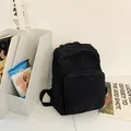 Minimalistische zwarte rugzak van gewassen canvas met voorvak met rits voor schoolgebruik - Zwart