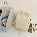 Retro rugzak van gewassen canvas in crèmewit met handig ritsvak aan de voorzijde - Broken Wit