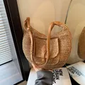 Straw woven saddle bag with brown leather strap and front pocket for summer beach vacation - Khaki
