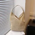 Borsa tote francese in paglia intrecciata beige con manici in pelle e trama a rete - Kaki