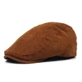 Modern corduroy flat cap in caramel brown, stylish winter beret for men shown from the side - M / Caramel color