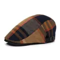 Vintage navy and orange plaid flat cap with adjustable brown strap on white background - Adjustable / Coffee
