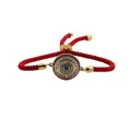 Bracciale etnico con corda rossa, ciondolo malocchio dorato e zirconi colorati intarsiati - Corda Rossa Base