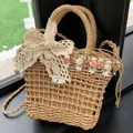 Woven straw bucket bag with lace bow and floral accents in natural beige finish - Small Floral Style / Khaki