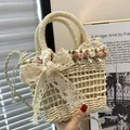 Straw bucket bag in beige with large lace bow and colorful fabric rose details - Small Floral Style / Off White