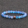8mm moonstone beaded bracelet with rose gold zircon pave ball on dark display mat - Iridescent Blue (Rose Gold Zircon Ball 3)