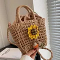 Straw bucket bag with sunflower charm and woven texture in natural brown finish - Sunflower Pompom Style / Khaki