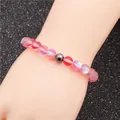 8mm moonstone and hematite beaded bracelet with pink gradient and matte finish luster - Pink
