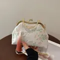 Handtasche im chinesischen Vintage-Stil mit Stickerei, Pfirsichmuster und rosa Quaste - Rosa