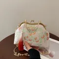 Vintage-Abendtasche in Rosa mit Stickerei, Orangen-Persimone-Muster und Quastenanhänger - Orange