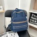 Vintage dark blue denim backpack with double front zippers and retro washed finish - Dark Blue